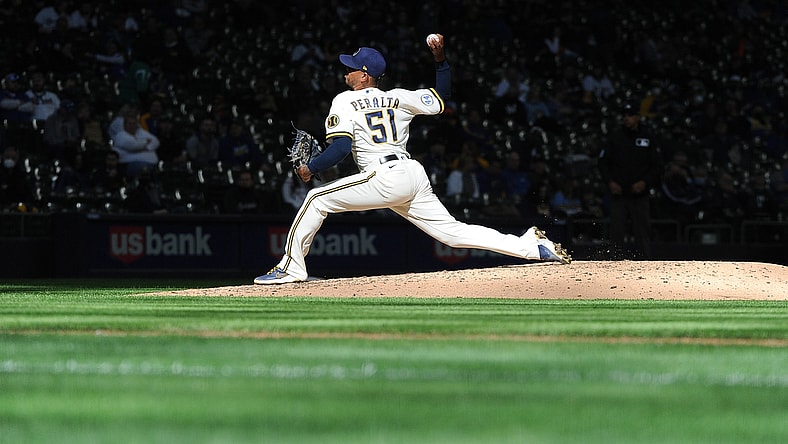 Apr 1, 2021; Milwaukee, Wisconsin, USA; Milwaukee Brewers relief pitcher Freddy Peralta (51) delivers a pitch against the Minnesota Twins in the sixth inning at American Family Field. Mandatory Credit: Michael McLoone-USA TODAY Sports