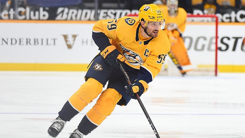 Apr 1, 2021; Nashville, Tennessee, USA; Nashville Predators defenseman Roman Josi (59) skates with the puck during the first period against the Dallas Stars at Bridgestone Arena. Mandatory Credit: Christopher Hanewinckel-USA TODAY Sports