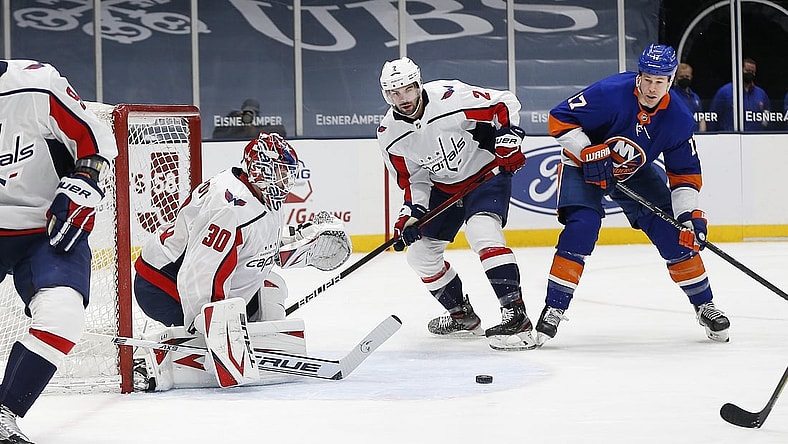 Apr 1, 2021; Uniondale, New York, USA; Washington Capitals goaltender Ilya Samsonov (30) makes a save against the New York Islanders during the second period at Nassau Veterans Memorial Coliseum. Mandatory Credit: Andy Marlin-USA TODAY Sports
