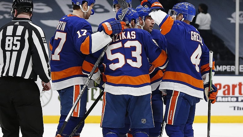 Apr 1, 2021; Uniondale, New York, USA; New York Islanders center Casey Cizikas (53) is congratulated after scoring a goal against the Washington Capitals during the second period at Nassau Veterans Memorial Coliseum. Mandatory Credit: Andy Marlin-USA TODAY Sports