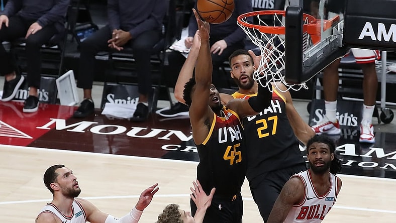Apr 2, 2021; Salt Lake City, Utah, USA; Utah Jazz guard Donovan Mitchell (45) tips in a miss shot as the shot clock expires in the second half against the Chicago Bulls at Vivint Smart Home Arena. Mandatory Credit: Rob Gray-USA TODAY Sports