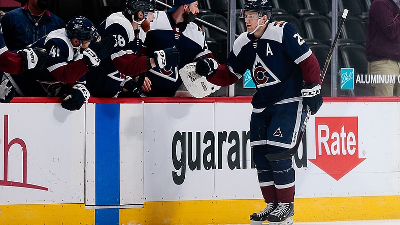 Apr 2, 2021; Denver, Colorado, USA; Colorado Avalanche center Nathan MacKinnon (29) celebrates with the bench after his second goal of the game against the St. Louis Blues at Ball Arena. Mandatory Credit: Isaiah J. Downing-USA TODAY Sports