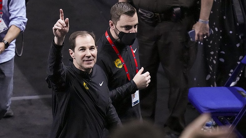Apr 3, 2021; Indianapolis, Indiana, USA; Baylor Bears head coach Scott Drew (left) waves to the crowd as he walks off the court after the game against the Houston Cougars in the national semifinals of the Final Four of the 2021 NCAA Tournament at Lucas Oil Stadium. Mandatory Credit: Kyle Terada-USA TODAY Sports