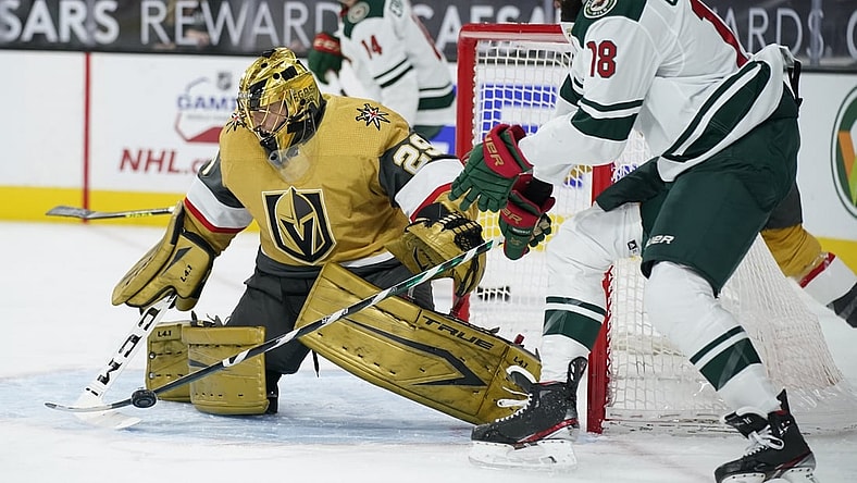 Apr 3, 2021; Las Vegas, Nevada, USA; Vegas Golden Knights goaltender Marc-Andre Fleury (29) blocks a shot by the Minnesota Wild during the first period at T-Mobile Arena. Mandatory Credit: John Locher/POOL PHOTOS-USA TODAY Sports
