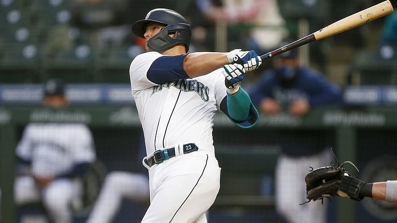 Apr 3, 2021; Seattle, Washington, USA; Seattle Mariners second baseman Ty France (23) hits a solo home run against the San Francisco Giants during the third inning at T-Mobile Park. Mandatory Credit: Joe Nicholson-USA TODAY Sports