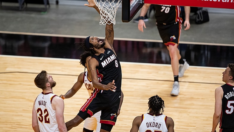 Apr 3, 2021; Miami, Florida, USA; Miami Heat forward Trevor Ariza (8) attempts a layup during the fourth quarter of a game against the Cleveland Cavaliers at American Airlines Arena. Mandatory Credit: Mary Holt-USA TODAY Sports