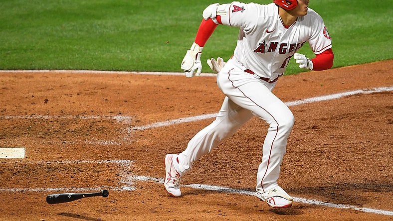 Apr 3, 2021; Anaheim, California, USA; Los Angeles Angels designated hitter Shohei Ohtani (17) runs to first base after hitting  a single against the Chicago White Sox in the fifth Inning at Angel Stadium. Mandatory Credit: Jayne Kamin-Oncea-USA TODAY Sports
