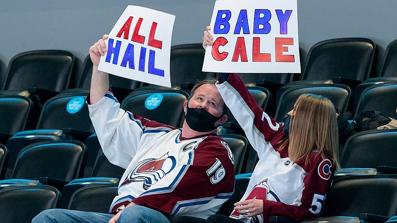 Apr 3, 2021; Denver, Colorado, USA; Colorado Avalanche fans hold up signs for defenseman Cale Makar (not pictured) in the third period of the game against the St. Louis Blues at Ball Arena. Mandatory Credit: Isaiah J. Downing-USA TODAY Sports