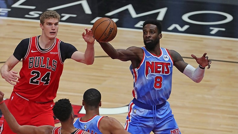 Apr 4, 2021; Chicago, Illinois, USA; Chicago Bulls forward Lauri Markkanen (24) and Brooklyn Nets forward Jeff Green (8) fight for a rebound during the second quarter at the United Center. Mandatory Credit: Dennis Wierzbicki-USA TODAY Sports