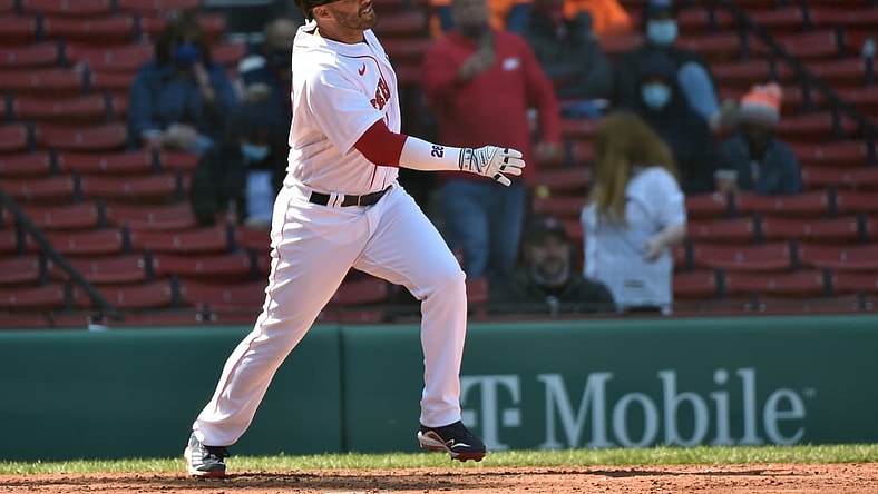 Apr 4, 2021; Boston, Massachusetts, USA;  Boston Red Sox designated hitter J.D. Martinez (28) hits a home run during the fourth inning against the Baltimore Orioles at Fenway Park. Mandatory Credit: Bob DeChiara-USA TODAY Sports