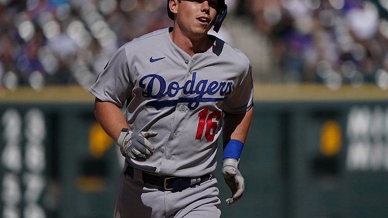 Apr 4, 2021; Denver, Colorado, USA; Los Angeles Dodgers catcher Will Smith (16) runs out his solo home run in the eighth inning against the against the Colorado Rockies at Coors Field. Mandatory Credit: Ron Chenoy-USA TODAY Sports