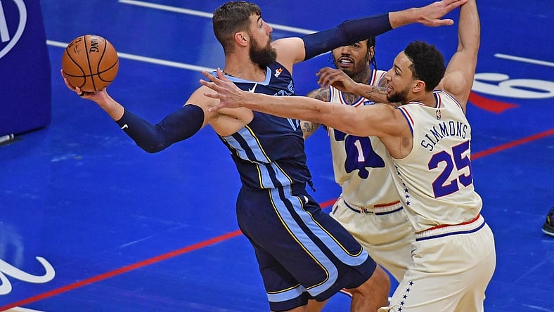 Apr 4, 2021; Philadelphia, Pennsylvania, USA;  Memphis Grizzlies center Jonas Valanciunas (17) is defended by Philadelphia 76ers forward Mike Scott (1) and guard Ben Simmons (25)  during the first quarter at Wells Fargo Center. Mandatory Credit: Eric Hartline-USA TODAY Sports