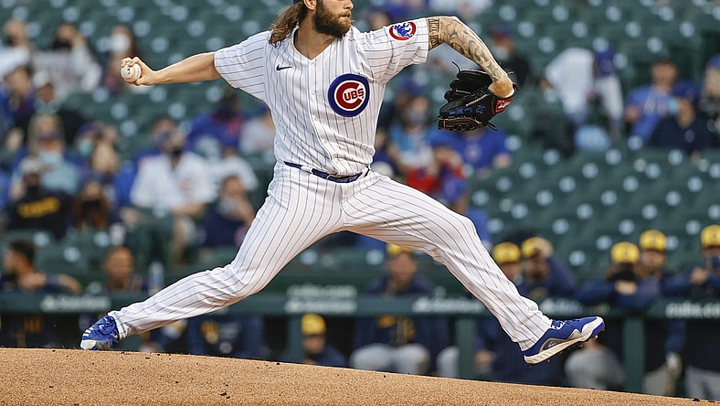 Apr 5, 2021; Chicago, Illinois, USA; Chicago Cubs starting pitcher Trevor Williams (32) delivers against the Milwaukee Brewers during the first inning at Wrigley Field. Mandatory Credit: Kamil Krzaczynski-USA TODAY Sports