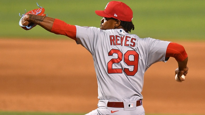 Apr 5, 2021; Miami, Florida, USA; St. Louis Cardinals relief pitcher Alex Reyes (29) pitches against the Miami Marlins in the ninth inning at loanDepot Park. Mandatory Credit: Jim Rassol-USA TODAY Sports