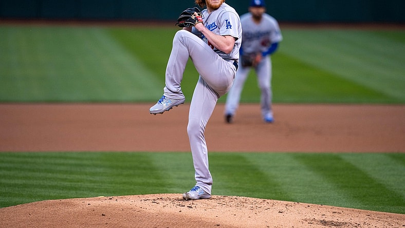 Apr 5, 2021; Oakland, California, USA; Los Angeles Dodgers starting pitcher Dustin May (85) delivers a pitch against the Oakland Athletics during the first inning at RingCentral Coliseum. Mandatory Credit: Neville E. Guard-USA TODAY Sports