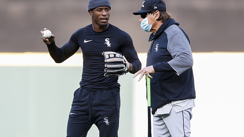 Apr 5, 2021; Seattle, Washington, USA; Chicago White Sox shortstop Tim Anderson (left) and manager Tony La Russa (22) talk during pregame warmups before a game against the Seattle Mariners at T-Mobile Park. Mandatory Credit: Joe Nicholson-USA TODAY Sports