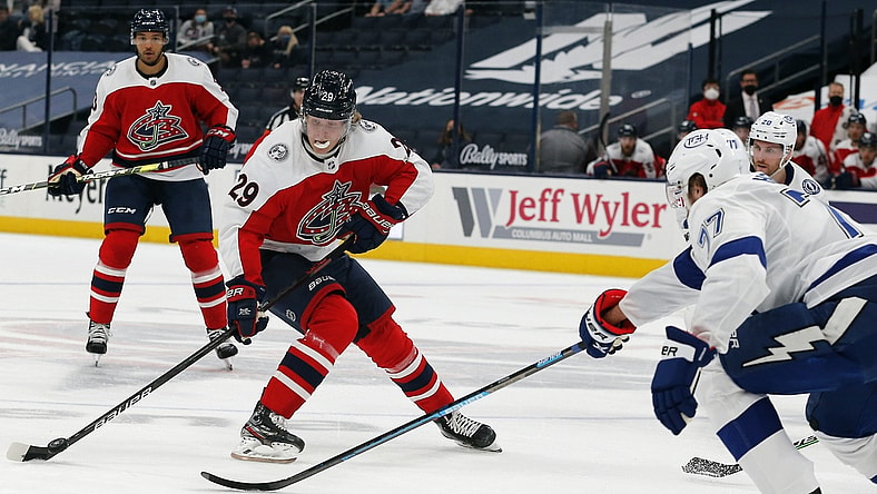 Apr 6, 2021; Columbus, Ohio, USA; Columbus Blue Jackets right wing Patrik Laine (29) shoots the puck as Tampa Bay Lightning defenseman Victor Hedman (77) defends during the first period at Nationwide Arena. Mandatory Credit: Russell LaBounty-USA TODAY Sports