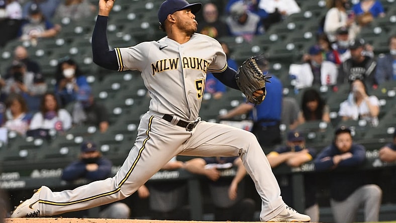 Apr 6, 2021; Chicago, Illinois, USA; Milwaukee Brewers starting pitcher Freddy Peralta (51) delivers against the Chicago Cubs in the first inning at Wrigley Field. Mandatory Credit: Matt Marton-USA TODAY Sports