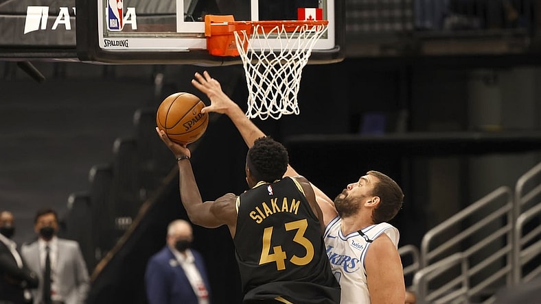 Apr 6, 2021; Tampa, Florida, USA; Los Angeles Lakers center Marc Gasol (14) blocks Toronto Raptors forward Pascal Siakam (43) shot during the second quarter at Amalie Arena. Mandatory Credit: Kim Klement-USA TODAY Sports