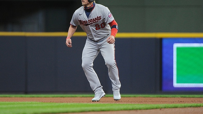 Apr 1, 2021; Milwaukee, Wisconsin, USA;  Minnesota Twins third baseman Josh Donaldson (20) on second base at American Family Field. Mandatory Credit: Michael McLoone-USA TODAY Sports