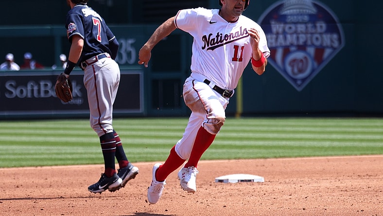 Apr 7, 2021; Washington, District of Columbia, USA; Washington Nationals first baseman Ryan Zimmerman (11) advances to third base on a single by Washington Nationals third baseman Starlin Castro (not pictured) against the Atlanta Braves in the second inning at Nationals Park. Mandatory Credit: Geoff Burke-USA TODAY Sports