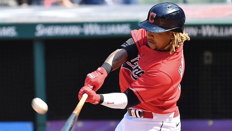 Apr 7, 2021; Cleveland, Ohio, USA; Cleveland Indians third baseman Jose Ramirez (11) hits a two run home run during the sixth inning against the Kansas City Royals at Progressive Field. Mandatory Credit: Ken Blaze-USA TODAY Sports