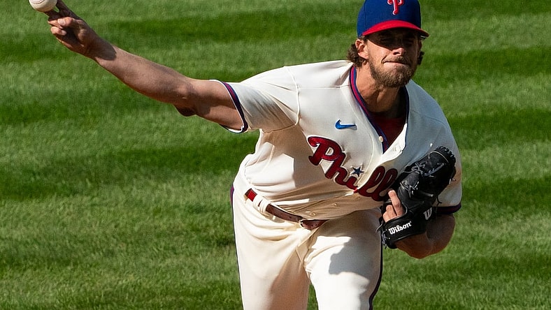 Apr 7, 2021; Philadelphia, Pennsylvania, USA; Philadelphia Phillies starting pitcher Aaron Nola (27) pitches during the first inning against the New York Mets at Citizens Bank Park. Mandatory Credit: Bill Streicher-USA TODAY Sports