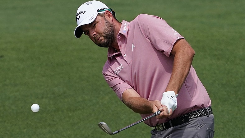 Apr 8, 2021; Augusta, Georgia, USA; Marc Leishman chips onto the 2nd green during the first round of The Masters golf tournament. Mandatory Credit: Michael Madrid-USA TODAY Sports