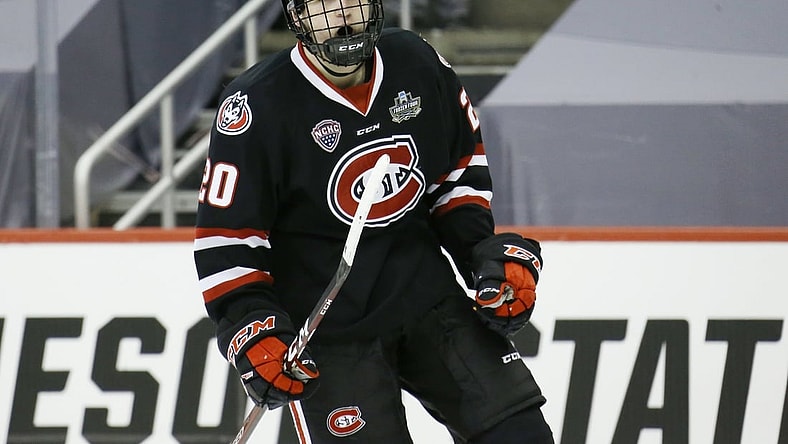 Apr 8, 2021; Pittsburgh, PA, USA; St. Cloud State Huskies forward Nolan Walker (20) celebrates his goal during the third period in the semifinals of the 2021 NCAA Frozen Four college hockey tournament against the Minnesota State Mavericks at PPG Paints Arena. Mandatory Credit: Charles LeClaire-USA TODAY Sports