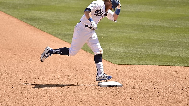 Apr 9, 2021; Los Angeles, California, USA; Los Angeles Dodgers third baseman Justin Turner (10) rounds the bases after hitting a solo home run during the sixth inning against the Washington Nationals at Dodger Stadium. Mandatory Credit: Kelvin Kuo-USA TODAY Sports