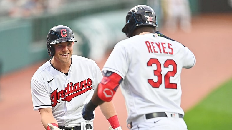 Apr 9, 2021; Cleveland, Ohio, USA; Cleveland Indians first baseman Jake Bauers (10) celebrates with designated hitter Franmil Reyes (32) after Reyes hit a home run during the first inning against the Detroit Tigers at Progressive Field. Mandatory Credit: Ken Blaze-USA TODAY Sports