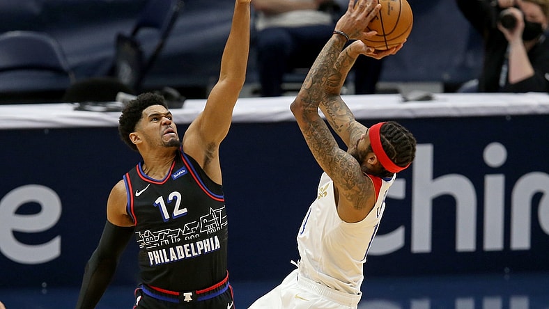 Apr 9, 2021; New Orleans, Louisiana, USA; Philadelphia 76ers forward Tobias Harris (12) defends New Orleans Pelicans forward Brandon Ingram (14) in the first quarter at the Smoothie King Center. Mandatory Credit: Chuck Cook-USA TODAY Sports