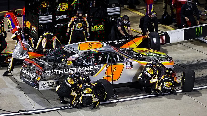 Apr 9, 2021; Martinsville, VA, USA; NASCAR Xfinity Series driver Noah Gragson (9) makes a pit stop at Martinsville Speedway. Mandatory Credit: Ryan Hunt-USA TODAY Sports