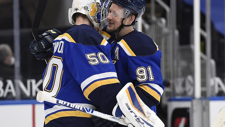 Apr 9, 2021; St. Louis, Missouri, USA; St. Louis Blues right wing Vladimir Tarasenko (91) congratulates St. Louis Blues goaltender Jordan Binnington (50) after beating the Minnesota Wild 9-1 at Enterprise Center. Mandatory Credit: Joe Puetz-USA TODAY Sports