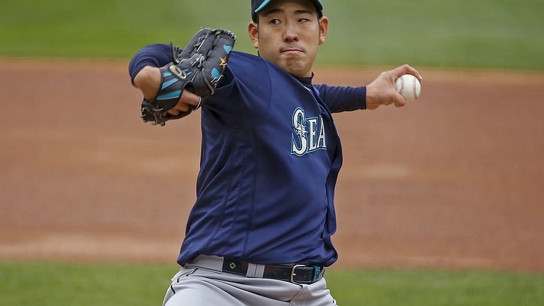 Apr 10, 2021; Minneapolis, Minnesota, USA; Seattle Mariners starting pitcher Yusei Kikuchi (18) pitches to a Minnesota Twins batter during the second inning at Target Field. Mandatory Credit: Bruce Kluckhohn-USA TODAY Sports