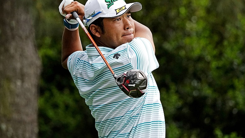 Apr 10, 2021; Augusta, Georgia, USA; Hideki Matsuyama plays his shot from the 15th tee during the third round of The Masters golf tournament. Mandatory Credit: Michael Madrid-USA TODAY Sports