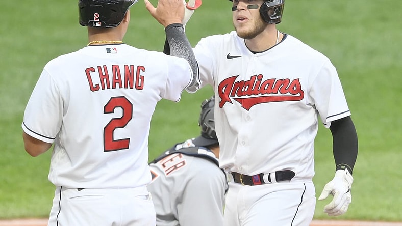 Apr 10, 2021; Cleveland, Ohio, USA; Cleveland Indians catcher Roberto Perez (55) celebrates his two-run home run with first baseman Yu Chang (2) in the second inning against the Detroit Tigers at Progressive Field. Mandatory Credit: David Richard-USA TODAY Sports