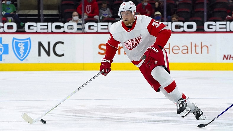 Apr 10, 2021; Raleigh, North Carolina, USA; Detroit Red Wings right wing Anthony Mantha (39) skates with the puck against the Carolina Hurricanes at PNC Arena. Mandatory Credit: James Guillory-USA TODAY Sports