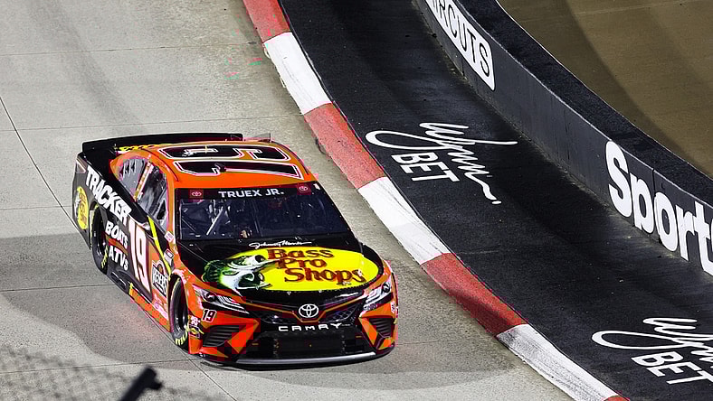 Apr 10, 2021; Martinsville, Virginia, USA; NASCAR Cup Series driver Martin Truex Jr. (19) races at the Blue-Emu Maximum Pain Relief 500 at Martinsville Speedway. Mandatory Credit: Ryan Hunt-USA TODAY Sports