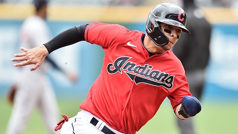 Apr 11, 2021; Cleveland, Ohio, USA; Cleveland Indians shortstop Andres Gimenez (0) rounds third base en route to scoring during the third inning against the Detroit Tigers at Progressive Field. Mandatory Credit: Ken Blaze-USA TODAY Sports
