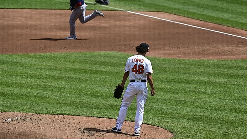 Apr 11, 2021; Baltimore, Maryland, USA;  Baltimore Orioles relief pitcher Jorge Lopez (48) stands on the pitcher's mound after giving up a solo home run to Boston Red Sox left fielder J.D. Martinez (28) during the third inning at Oriole Park at Camden Yards. Mandatory Credit: Tommy Gilligan-USA TODAY Sports