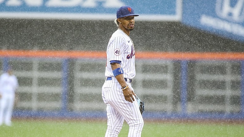 Apr 11, 2021; New York City, New York, USA; New York Mets shortstop Francisco Lindor (12) takes the field in the top of the first inning against the Miami Marlins prior to a rain delay at Citi Field. Mandatory Credit: Wendell Cruz-USA TODAY Sports
