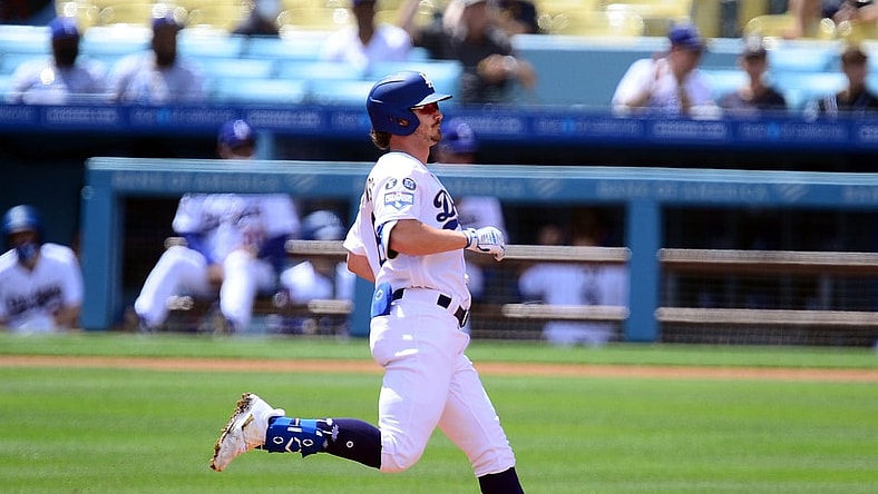 Apr 11, 2021; Los Angeles, California, USA; Los Angeles Dodgers left fielder Zach McKinstry (8) reaches second on an RBI double against the Washington Nationals during the second inning at Dodger Stadium. Mandatory Credit: Gary A. Vasquez-USA TODAY Sports