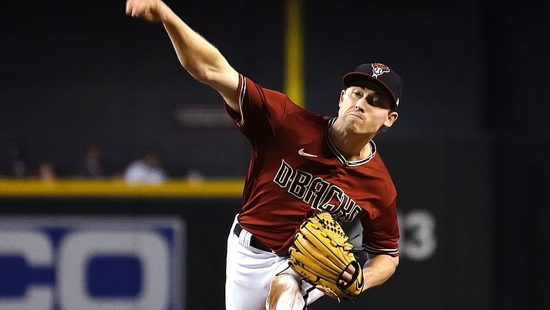 Apr 11, 2021; Phoenix, Arizona, USA; Arizona Diamondbacks starting pitcher Luke Weaver (24) throws against the Cincinnati Reds during a baseball game at Chase Field. Mandatory Credit: Rick Scuteri-USA TODAY Sports