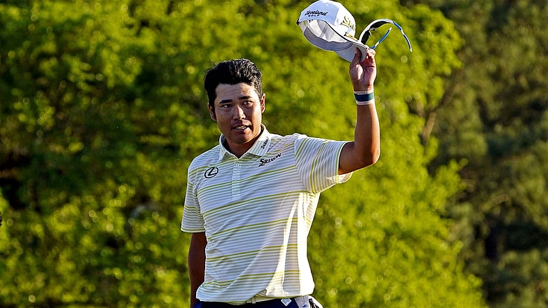 Apr 11, 2021; Augusta, Georgia, USA; Hideki Matsuyama reacts on the 18th green after winning The Masters golf tournament. Mandatory Credit: Michael Madrid-USA TODAY Sports