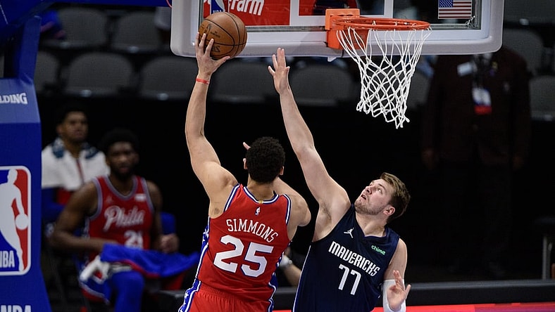 Apr 12, 2021; Dallas, Texas, USA; Dallas Mavericks guard Luka Doncic (77) guards Philadelphia 76ers guard Ben Simmons (25) during the first quarter at the American Airlines Center. Mandatory Credit: Jerome Miron-USA TODAY Sports