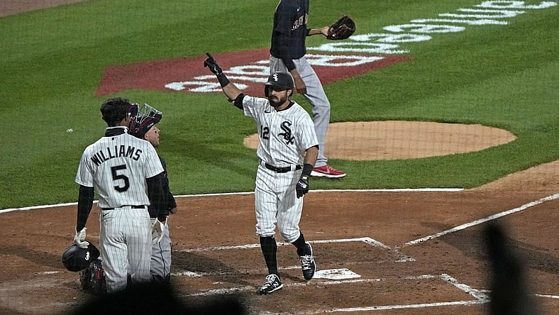 Apr 12, 2021; Chicago, Illinois, USA; Chicago White Sox right fielder Adam Eaton (12) reacts after hitting a three run home run against Cleveland Indians starting pitcher Triston McKenzie (24) during the third inning at Guaranteed Rate Field. Mandatory Credit: Mike Dinovo-USA TODAY Sports