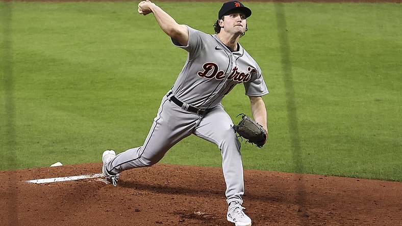 Apr 12, 2021; Houston, Texas, USA; Detroit Tigers starting pitcher Casey Mize (12) delivers a pitch during the third inning against the Houston Astros at Minute Maid Park. Mandatory Credit: Troy Taormina-USA TODAY Sports