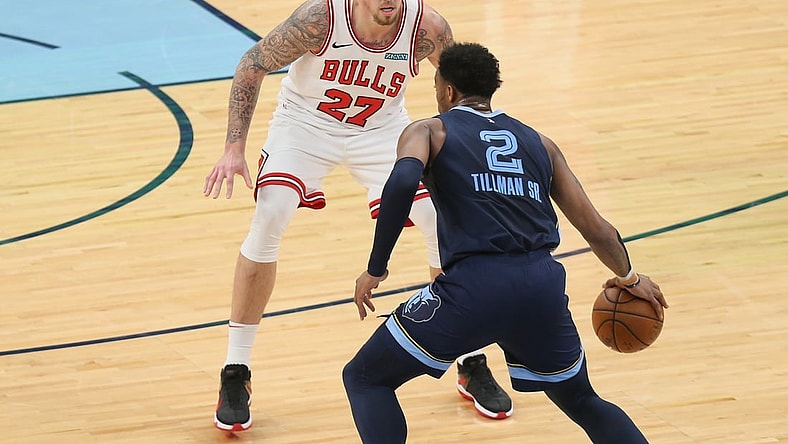 Apr 12, 2021; Memphis, Tennessee, USA; Memphis Grizzlies Xavier Tillman (2) dribbles the ball against Chicago Bulls center Daniel Theis (27)  the first half at FedExForum. Mandatory Credit: Nelson Chenault-USA TODAY Sports