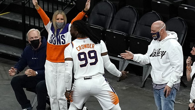 Apr 12, 2021; Phoenix, Arizona, USA; Phoenix Suns forward Jae Crowder (99) celebrates with the fans after scoring against the Houston Rockets in the first half at Phoenix Suns Arena. Mandatory Credit: Rick Scuteri-USA TODAY Sports